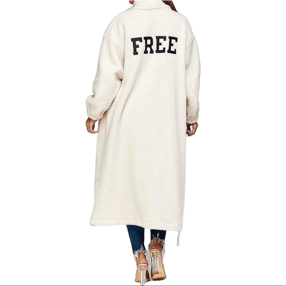 Cute and cozy SJK Fashion Teddy Bear coat in white. One size fits all.